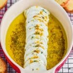 goat cheese appetizer recipe in a small baking dish - 12