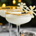 christmas martini in glasses rimmed with gold sugar