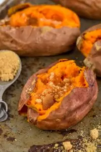 a crock pot sweet potato with brown sugar and butter on it