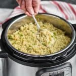 instant pot quinoa being dished out of an instant pot
