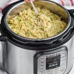instant pot quinoa being dished out of an instant pot
