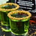 st patrick's day two shot glasses of lucky leprechaun shots rimmed with gold sprinkles