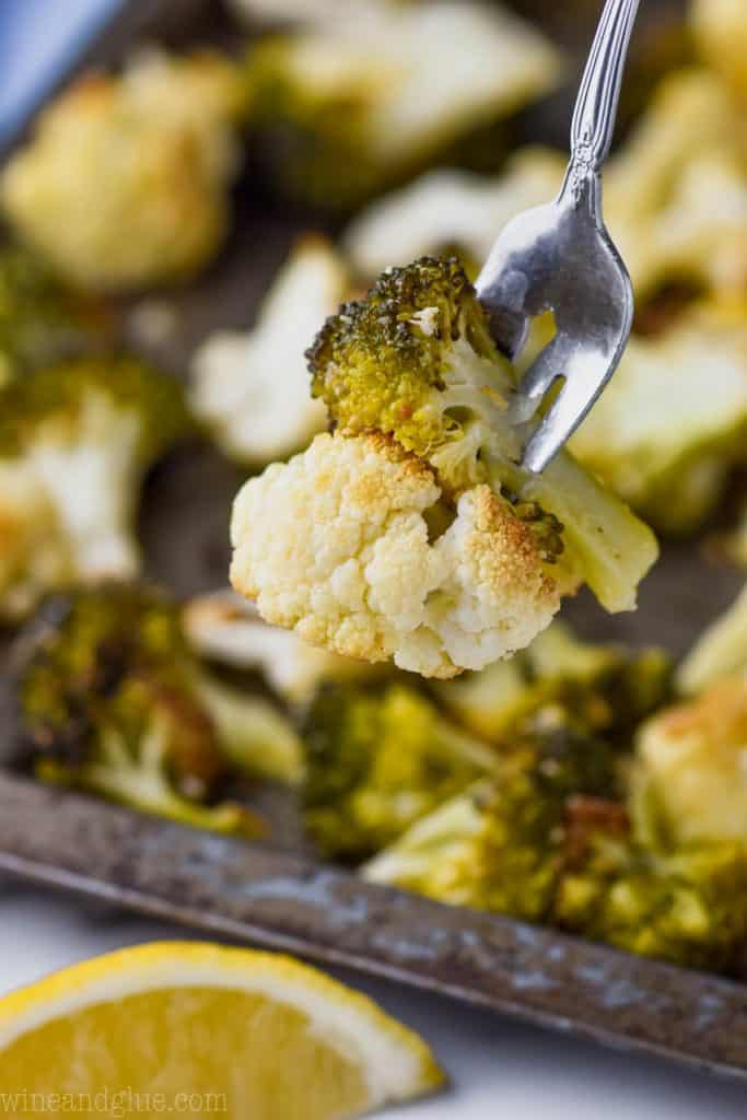 oven roasted broccoli and cauliflower on a fork