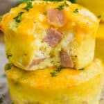 a ham and cheese egg muffin stacked on top of another ham and cheese egg muffin