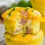 two ham and cheese egg muffins stacked