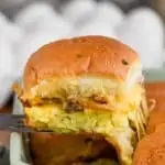 breakfast slider being pulled from casserole dish