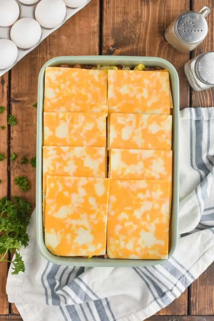 overhead view of breakfast sliders recipe cheese layer