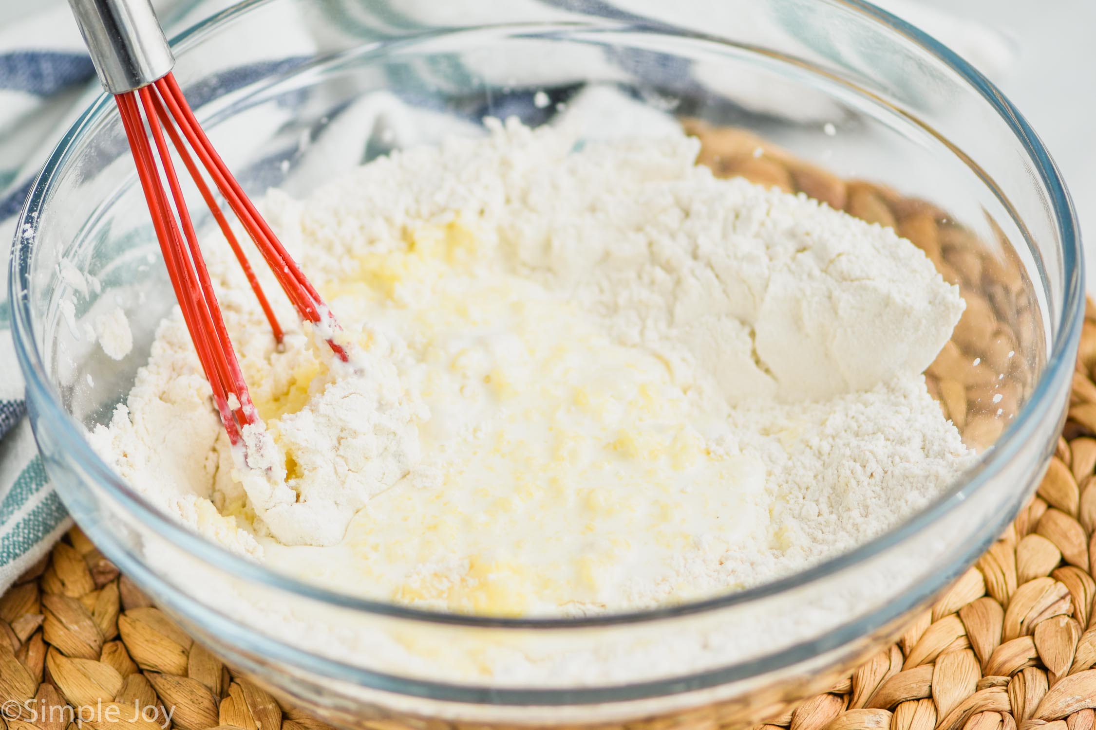 stirring buttermilk mixture into flour mixture to make easy drop biscuits