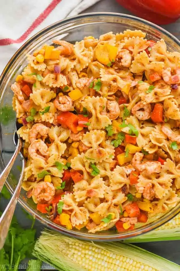 overhead view of a bowl of shrimp fajita pasta salad made with shrimp, vegetables, and bowtie pasta