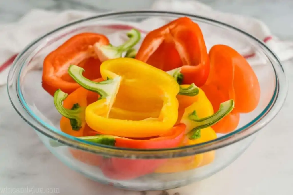 glass bowl filled with bell pepper halves