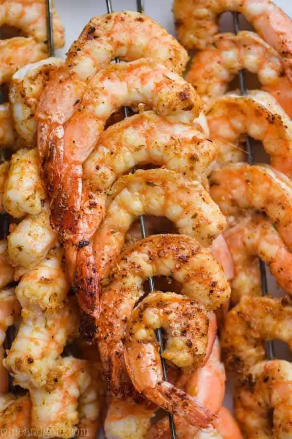 cajun shrimp skewers up close on metal skewers