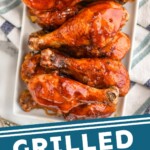 pinterest graphic of overhead view of plate of grilled bbq chicken legs, says: "grilled chicken legs, simplejoy.com"