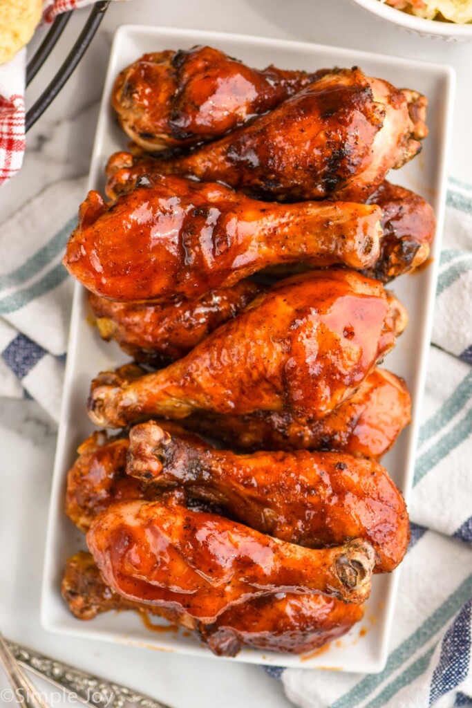 overhead view of plate of grilled bbq chicken legs