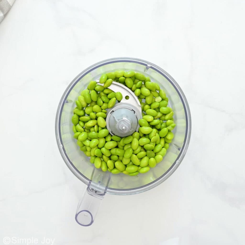 overhead of edamame in a food processor