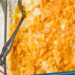pinterest graphic of overhead of a pan of funeral potatoes, says: "tried and true funeral potatoes, simplejoy.com"
