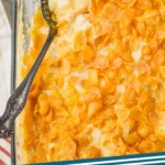 pinterest graphic of overhead of cheesy potatoes, says: "cheesy potatoes, simplejoy.com"