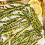 Pinterest graphic of overhead view of a baking sheet full of roast green beans