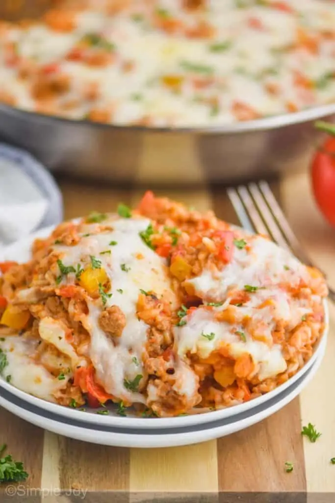 small plate full of stuffed pepper casserole garnished with parsley