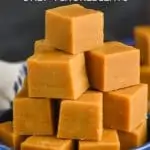 a pile of easy peanut butter fudge in a small blue dish