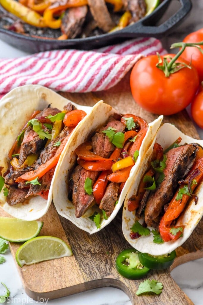 Overhead photo of Steak Fajitas served in tortilla shells.