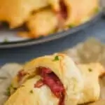 close up of a crescent roll made with corned beef to make it a reuben crescent roll