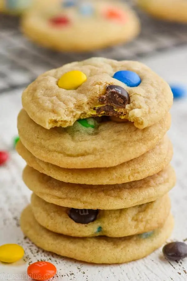 stack of six mm cookies with the top one missing a bite