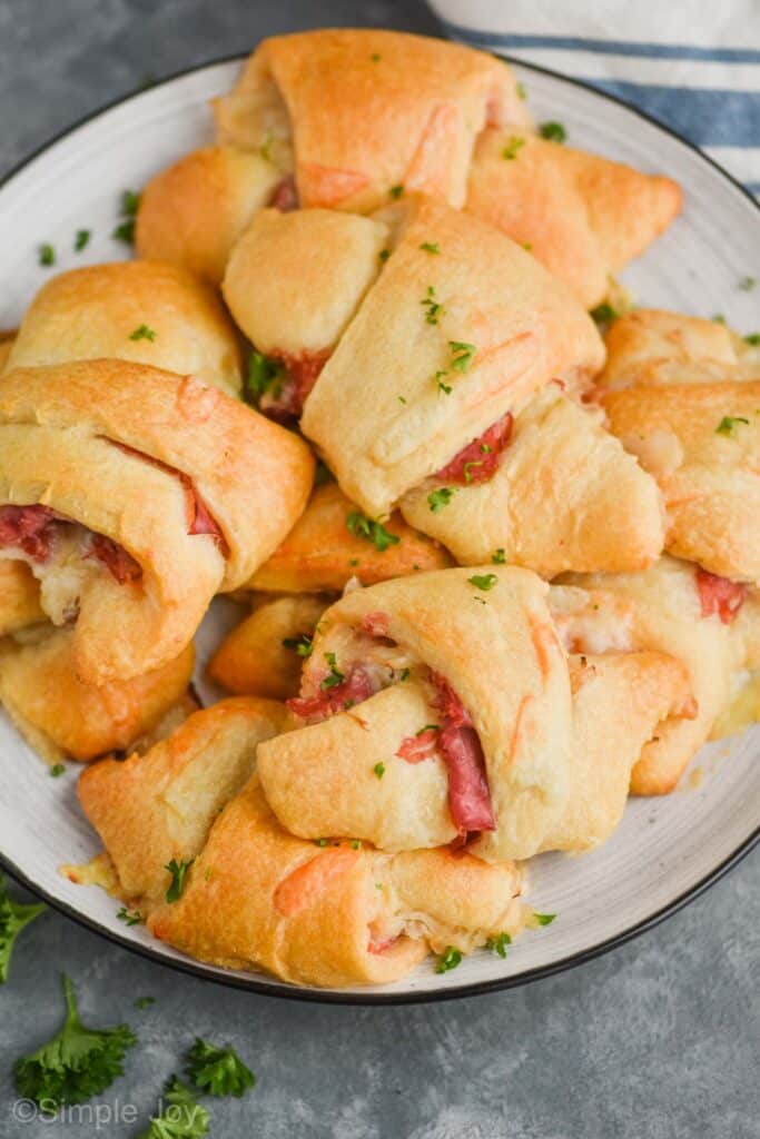 overhead of a plate with reuben crescent rolls on a plate