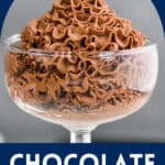 a small coup glass filled with chocolate whipped cream