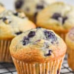 a healthy blueberry muffin on a wire cooling wrack