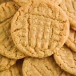 close up of a pile of peanut butter cookies - 13