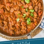pinterest graphic of overhead of a skillet full of beef curry