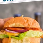 pinterest graphic of a hand holding a grilled chicken sandwich, says: the best grilled chicken sandwich simplejoy.com