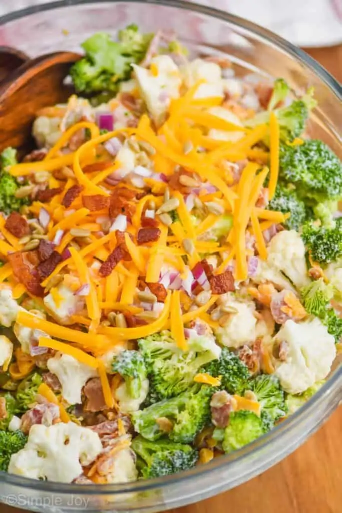 close up side view of broccoli and cauliflower salad