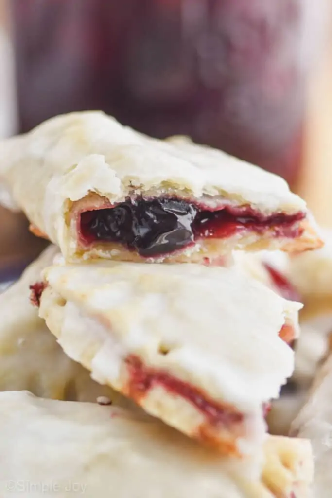 close up of a cherry hand pie that has been broken in half