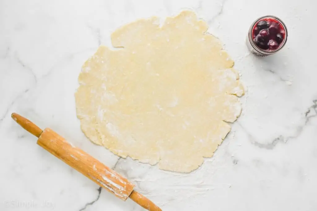 overhead view of rolled out pie crust dough