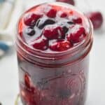 overhead view of mason jar full of cherry pie filling - 12