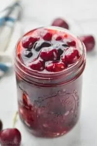 overhead view of mason jar full of cherry pie filling