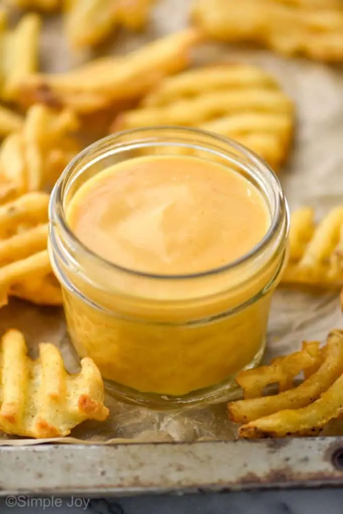 close up of a small mason jar holding Chick Fil A sauce