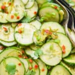 overhead of a bowl of asian cucumber salad made with thinly sliced cucumbers