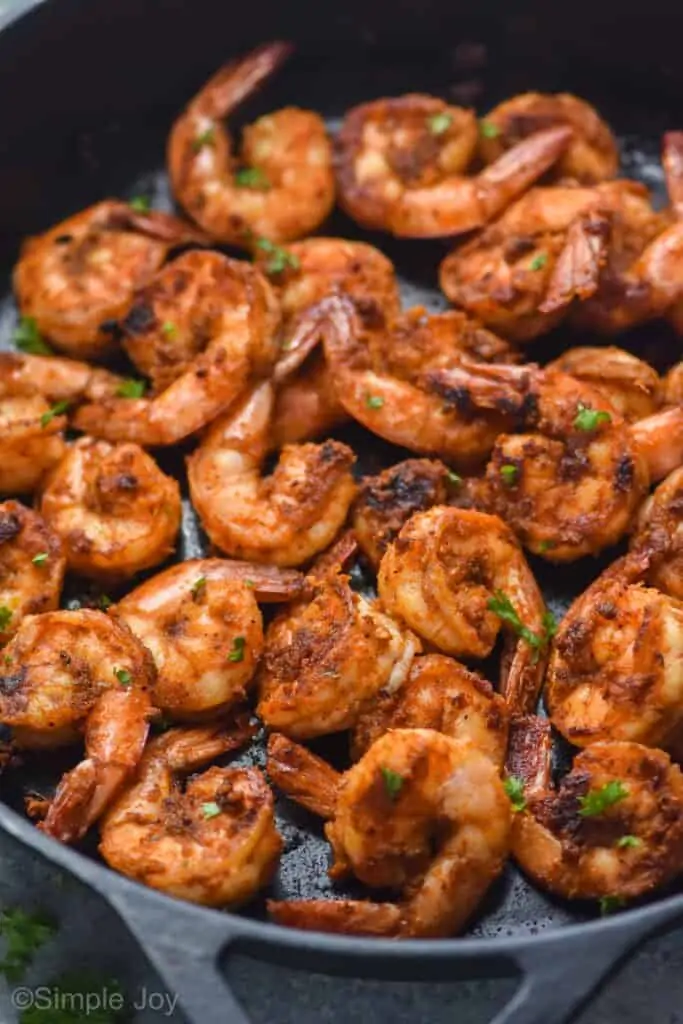 blackened shrimp in a cast iron pan