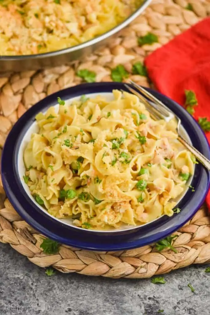 overhead view of a plate will easy tuna noodle casserole in it with a fork on it