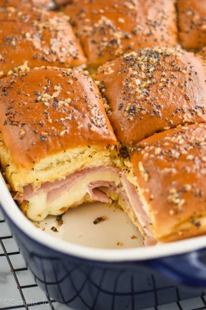 close up of Hawaiian ham and cheese sliders in a baking dish