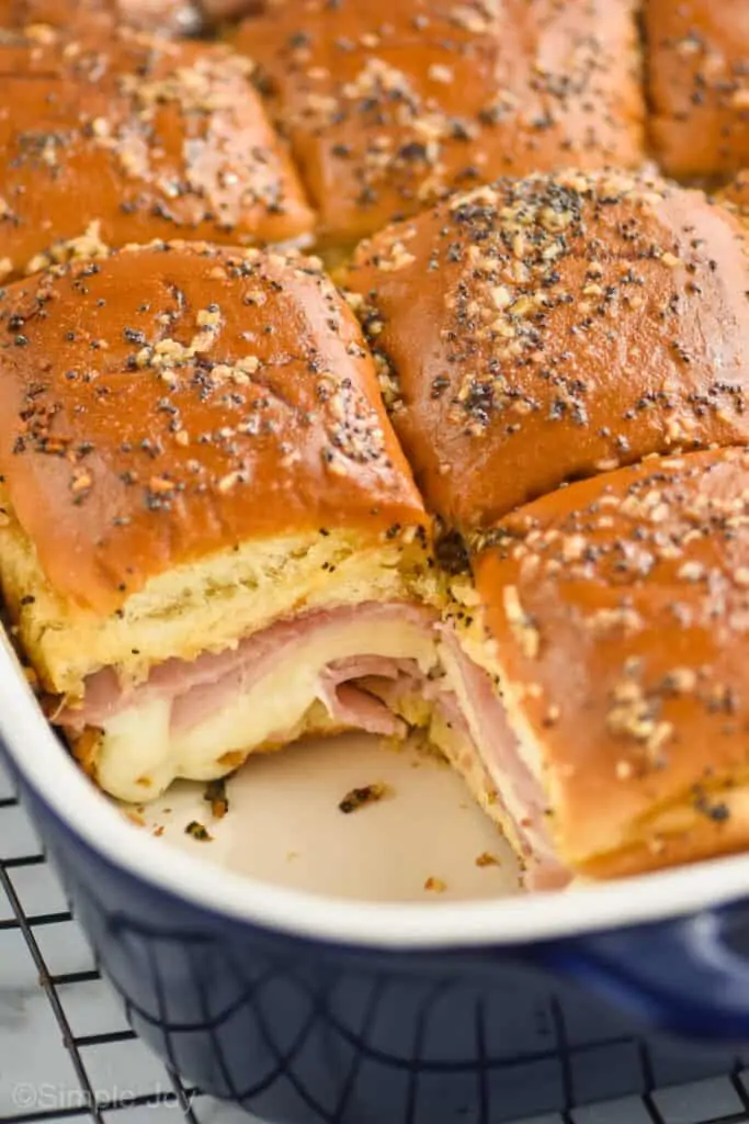 close up of Hawaiian ham and cheese sliders in a baking dish