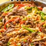 close up of a skillet full of beef lo mein