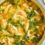 pinterest graphic of the overhead of a pot of lemon chicken orzo soup