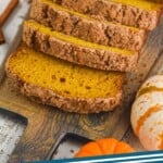 Pinterest graphic for Pumpkin Bread recipe. Image is overhead photo of sliced loaf of pumpkin bread. Text says, "Pumpkin Bread simplejoy.com"