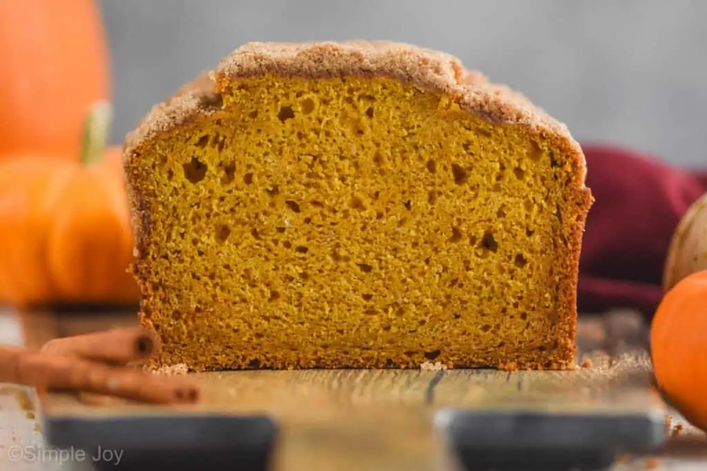 front on view of pumpkin bread that has been sliced into