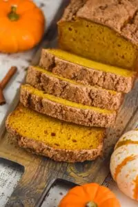 pumpkin bread recipe sliced on a cutting board