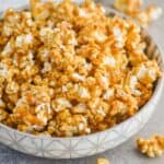 side view of a bowl of caramel corn - 6