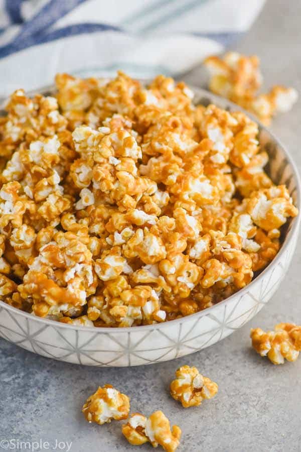 side view of a bowl of caramel corn